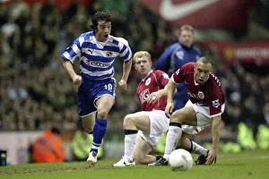 Stephen Hunt leaves Paul Scholes and Mikael Silvestre on the floor as he tears down Stephen Hunt leaves Paul Scholes and Mikael Silvestre on the floor as he tears down