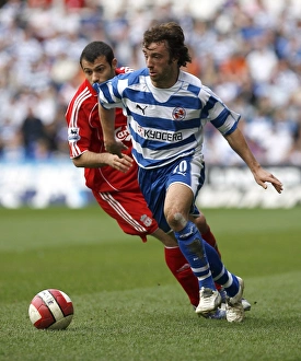 Stephen Hunt takes the ball past Javier Mascherano Stephen Hunt takes the ball past Javier Mascherano