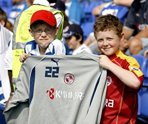 This young fan shows off Andre Bikeys training top This young fan shows off Andre Bikeys training top