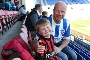 Images Dated 18th April 2015: Brighton and Hove Albion Fans' Passionate Support at Wigan Athletic Championship Match, April 2015